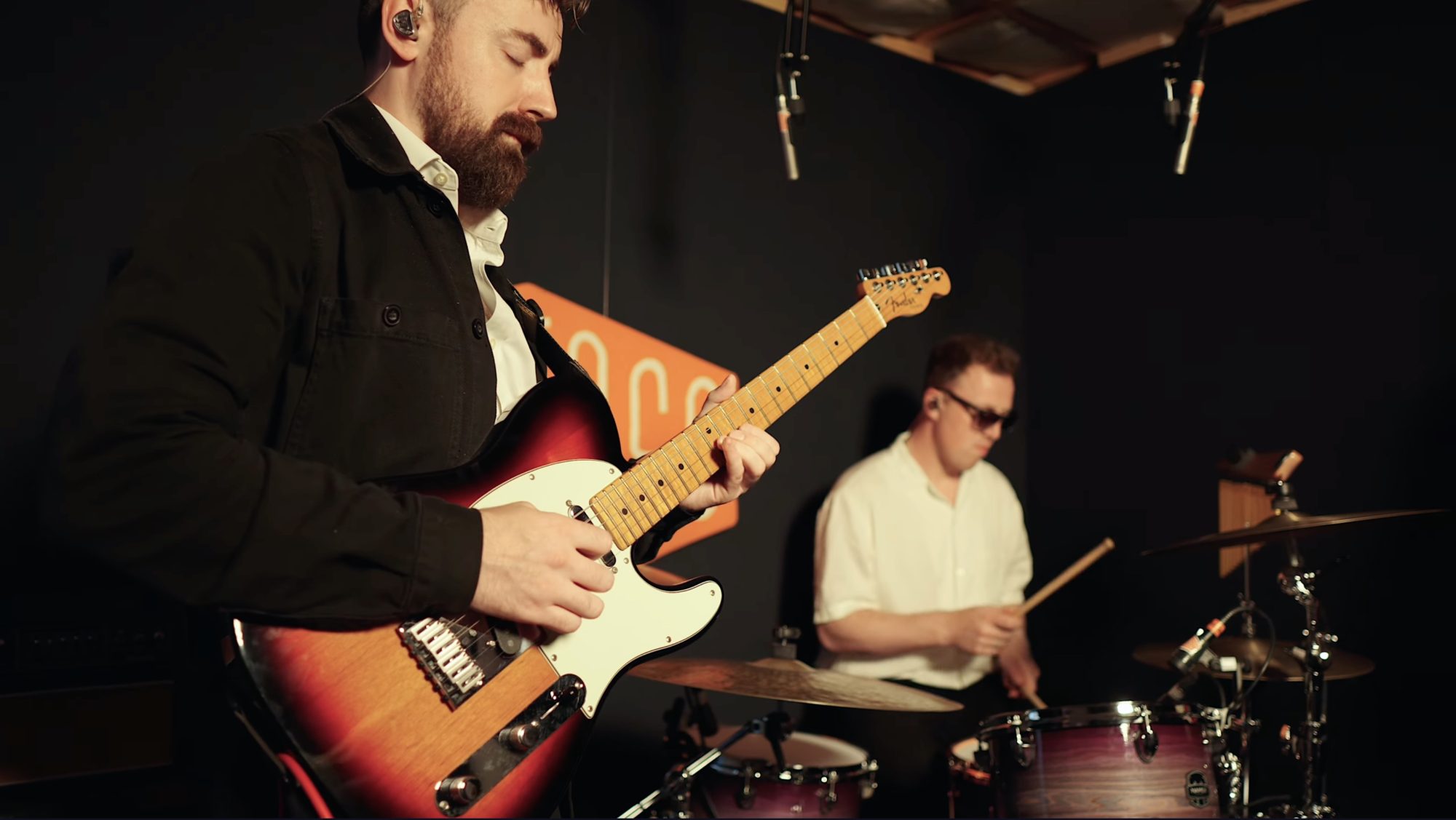 Artist recording a performance at Lost Oscillation